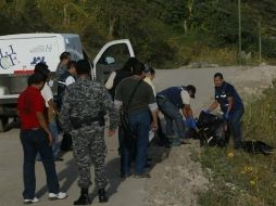 Personal de la Procuraduría estatal y del Insituto de Ciencias Forenses realizan las investigaciones.  /