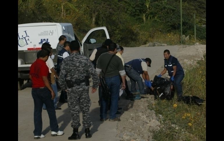 Personal de la Procuraduría estatal y del Insituto de Ciencias Forenses realizan las investigaciones.  /