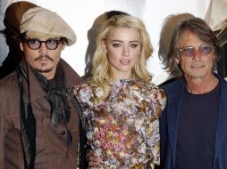 Johnny Depp, Amber Heard y Bruce Robinson, en una nueva aventura cinematográfica que promete. AFP  /