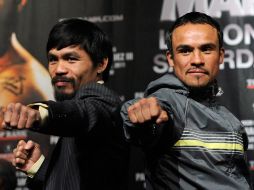 El púgil filipino Manny Pacquiao (i) y el mexicano Juan Manuel Márquez (d) se medirán el próximo sábado en Las Vegas. AFP  /