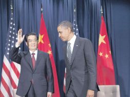 El mandatario de China, Hu Jintao y su homólogo estadounidense, Barack Obama, en rueda de prensa. AP  /