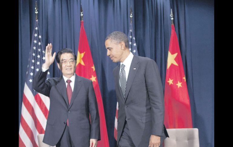 El mandatario de China, Hu Jintao y su homólogo estadounidense, Barack Obama, en rueda de prensa. AP  /