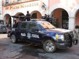 Elementos de la policía Federal realiza rondines por las calles de Morelia, durante la jornada electoral. NTX  /