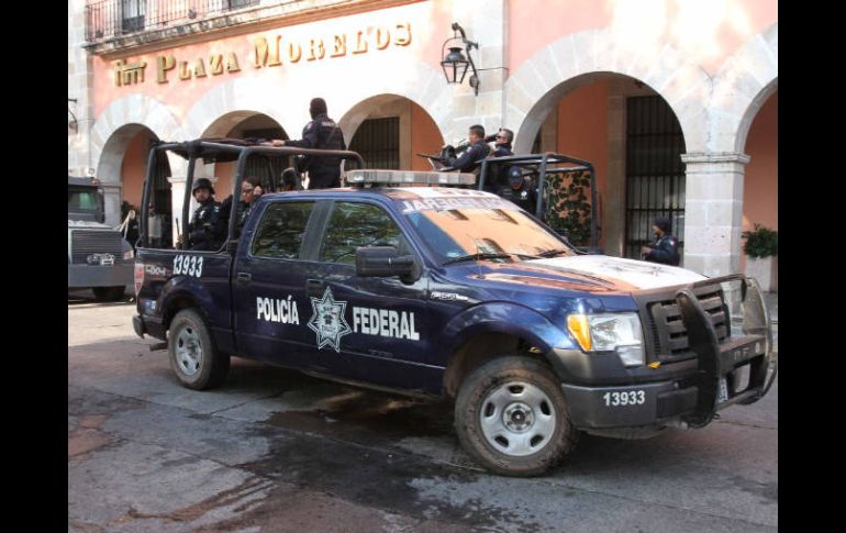 Elementos de la policía Federal realiza rondines por las calles de Morelia, durante la jornada electoral. NTX  /