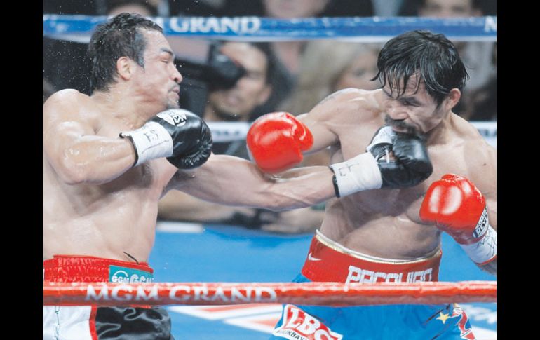 El cuarto agarrón entre Juan Manuel Márquez y Manny Pacquiao se realizaría en mayo de 2012. AP  /