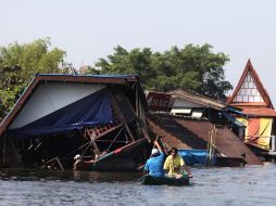 El Departamento de Irrigación del Gobierno confía en drenar en unos días el agua que cerca Bangkok hasta el mar. AP  /