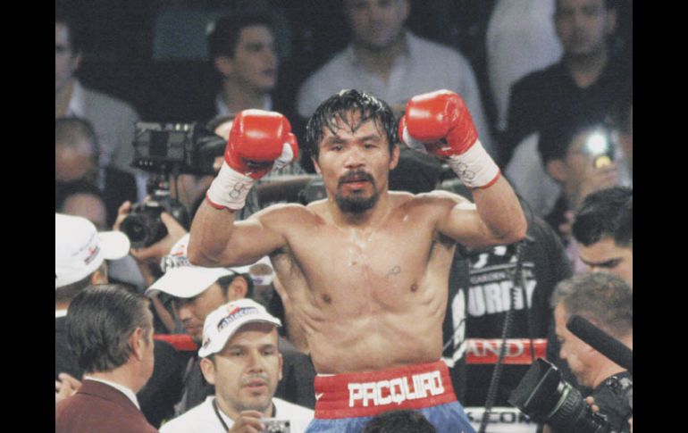 Manny Pacquiao ganó a Juan Manuel Márquez una pelea que ha desatado polémica. EFE  /