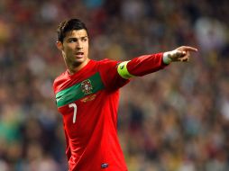 El delantero Cristiano Ronaldo celebra durante el partido contra Bosnia de la Eurocopa. AP  /