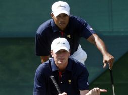 Woods y Stricker perdieron por 7 y 6 en ''foursomes'' (golpes alternos) frente a Adam Scott y el coreano KJ Choi. AP  /