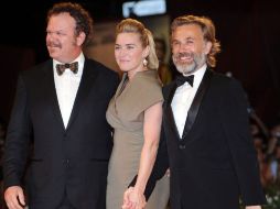 John C. Reilly, Kate Winslet y Christoph Waltz en la alfombra roja del estreno de 'Carnage' durante el Festival de Cine de Venecia.  /