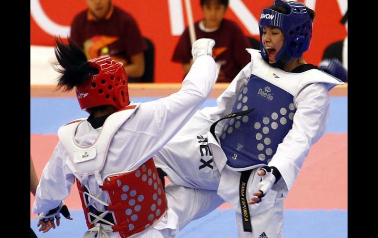 La sinaloense venció con punto de oro sobre el tatami a la dominicana para quedarse con el cupo a la justa veraniega. NOTIMEX  /