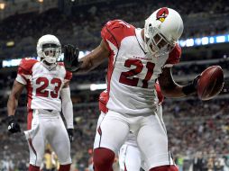 Patrick Peterson celebra su regreso de patada para anotación. AP  /