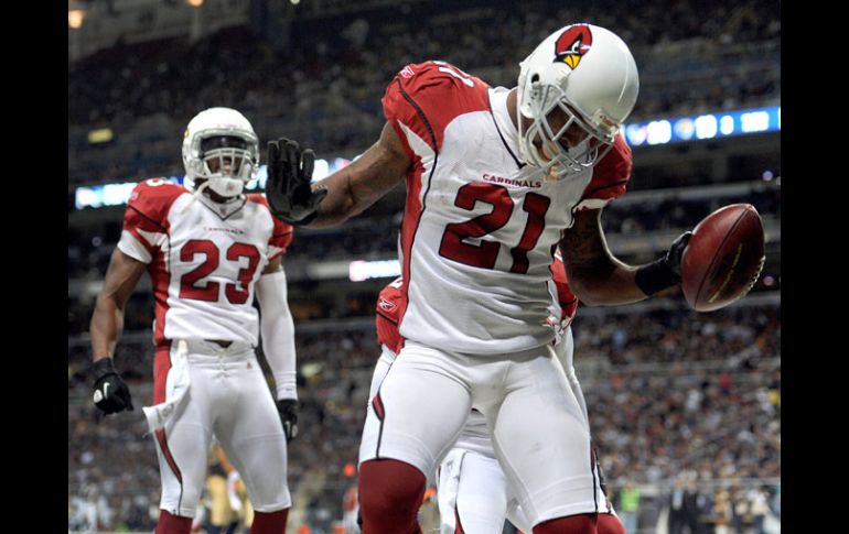 Patrick Peterson celebra su regreso de patada para anotación. AP  /