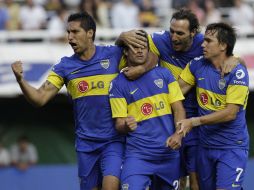 Los jugadores de Boca Juniors celebran uno de los goles que les dio el título en el futbo argentino. AP  /