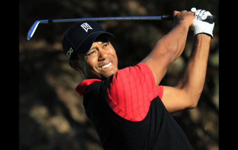 Woods se impuso con 278 golpes y un birdie en su último hoyo. REUTERS  /