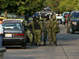 En la vivienda localizaron fusil AR-15, cargadores abastecidos del calibre .223, así como un misil antiaéreo. ESPECIAL  /