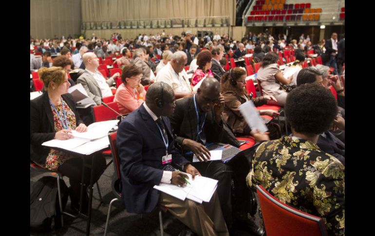 Delegados discuten durante la 17 Conferencia de Naciones Unidas sobre Cambio Climático en Durban. REUTERS  /