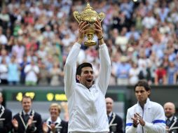 Algunos de los los logros durante este año de Djokovic son  tres Grand Slam, Australia, Wimbledon y el abierto de Estados Unidos. AFP  /