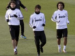 Ricardo Izecson dos Santos Kaká, (I-D) Esteban Granero, Marcelo Vieira y Álvaro Arbeloa, durante el entrenamiento del día de hoy. EFE  /