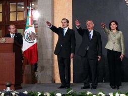 Calderón toma protesta al secretario particular, Tarcisio Rodríguez; Rafael Morgan y Rosalinda Vélez, titulares de SFP y STPS. NTX  /