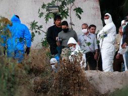 Peritos especializados excavaron en las fosas del edificio para dar con los restos humanos.  /