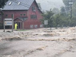 El huracán ''Irene'' dejó 14 muertos, apagones e inundaciones en Estados Unidos. AP  /