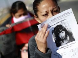 Activistas de las 'Mujeres de Juarez' participaron en la marcha que conmemora el primer año del asesinato de Marisela Escobedo. EFE  /