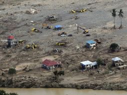 La imagen muestra una vista aérea de la localidad filipina de Cayagan de Oro, gravemente afectada por la tormenta tropical 'Washi'. EFE  /