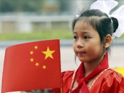 Mostraron una bandera con seis estrellas,  cuando la china sólo tiene cinco estrellas. AP  /