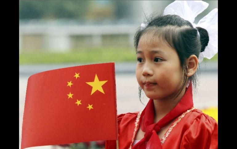 Mostraron una bandera con seis estrellas,  cuando la china sólo tiene cinco estrellas. AP  /