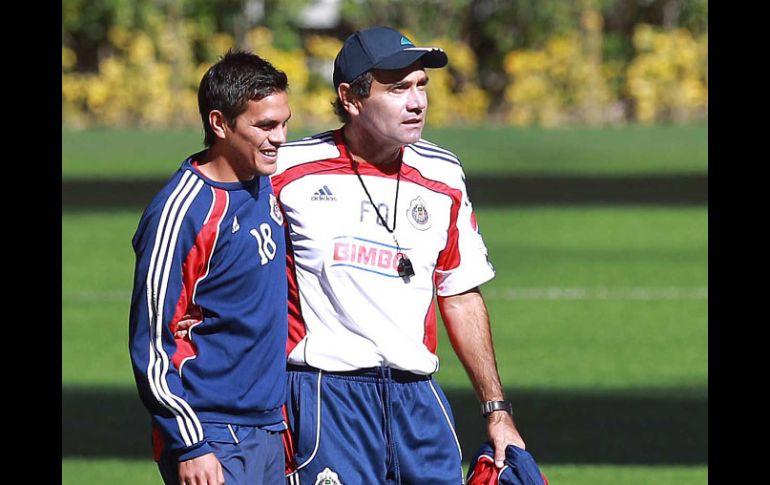 Xavier Báez y Fernando Quirarte durante uno de los entrenamientos del Guadalajara.  /