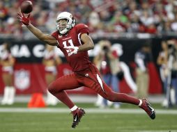 Larry Fitzgerald hizo una gran atrapada a una mano para preprar la victoria de los Cardenales. AP  /