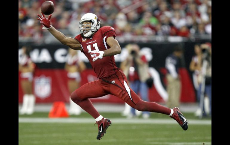 Larry Fitzgerald hizo una gran atrapada a una mano para preprar la victoria de los Cardenales. AP  /