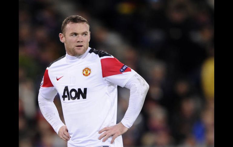 Wayne Rooney fue multado y suspendido del partido ante los Rovers por una salida nocturna. AFP  /