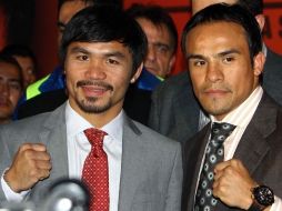 Manny Pacquiao y el mexicano Juan Manuel Márquez podrían enfrentarse de nuevo el 5 de mayo. MEXSPORT  /