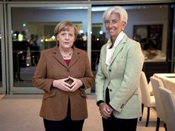 Ángela Merkel y Christine Lagarde se encontraron hoy para hablar de Grecia. EFE  /