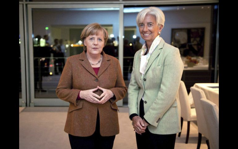 Ángela Merkel y Christine Lagarde se encontraron hoy para hablar de Grecia. EFE  /