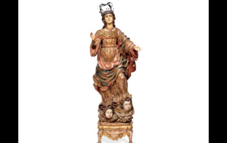 La Inmaculada Concepción de la Virgen María está coronada sobre nubes y un grupo de querubines. MORTONSUBASTAS.COM  /