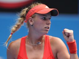 Wozniacki se impuso a la georgiana Anna Tatishvili por 6-1 y 7-6 (7-4). AFP  /