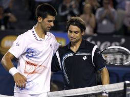 Durante el juego Ferrer logró por primera vez romper un saque de Novak Djokovic. AP  /