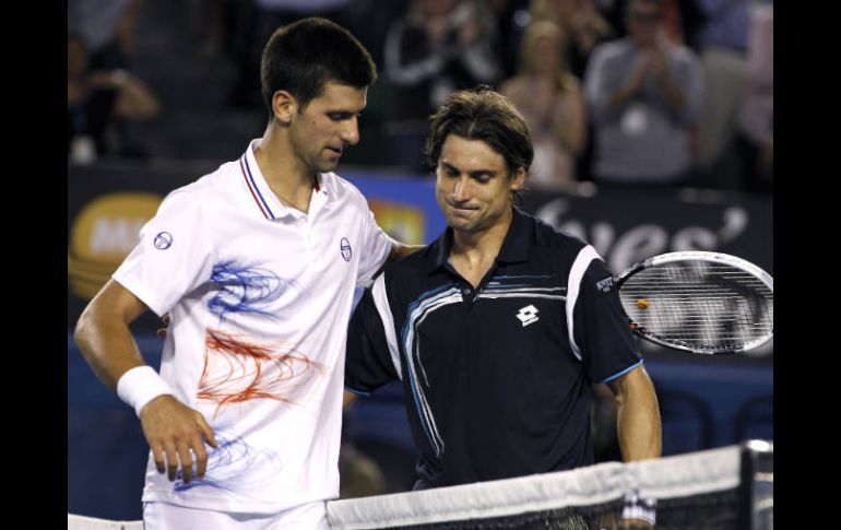 Durante el juego Ferrer logró por primera vez romper un saque de Novak Djokovic. AP  /