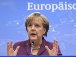 Pese a la firmeza de Angela Merkel para enfrentar la crisis, la situación no ha sido resuelta.AP  /