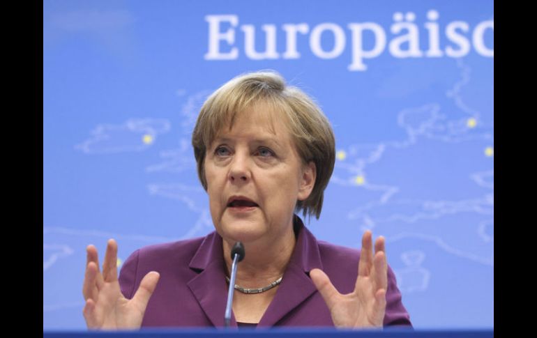 Pese a la firmeza de Angela Merkel para enfrentar la crisis, la situación no ha sido resuelta.AP  /