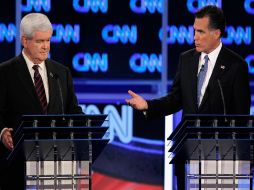 Newt Gingrich (der.) y Mitt Romney (izq.) durante un debate en Florida. AFP  /