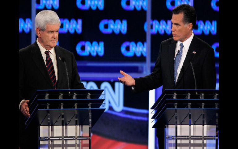 Newt Gingrich (der.) y Mitt Romney (izq.) durante un debate en Florida. AFP  /