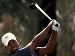 Woods exnúmero uno mundial quiere conseguir el título en el Campeonato de Abu Dabi. AFP  /