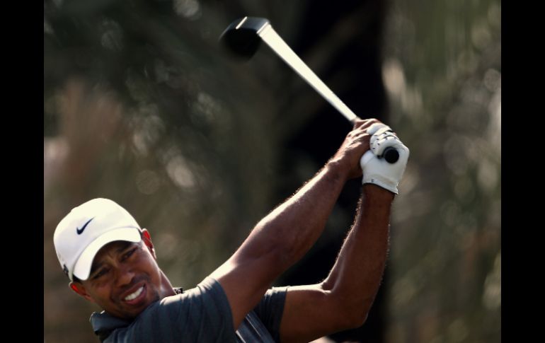 Woods exnúmero uno mundial quiere conseguir el título en el Campeonato de Abu Dabi. AFP  /