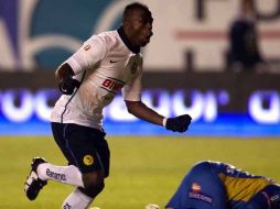 Christian Benítez celebra uno de sus dos tantos. AFP  /