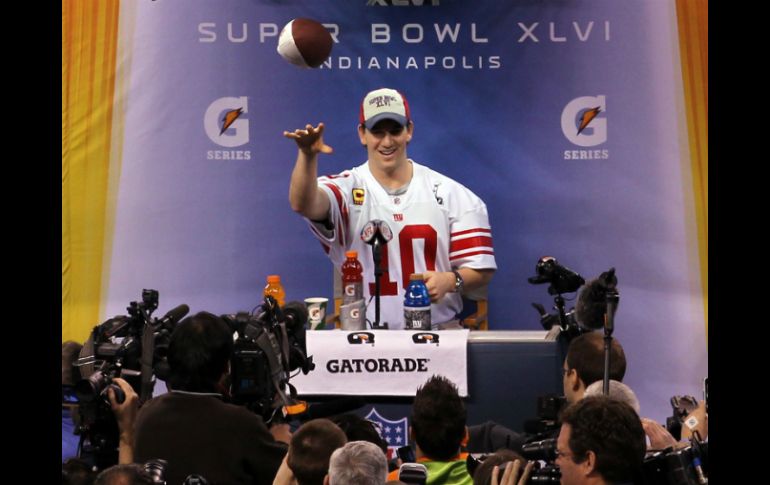 El quarterback neoyorquino Eli Manning disfrutó de su encuentro con los medios. AP  /