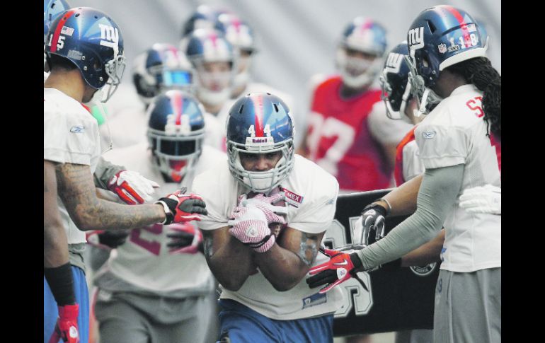 El jugador de los Gigantes, Ahmad Bradshaw, formó parte de la práctica del equipo este miércoles. AP  /